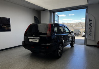 Подержанный автомобиль Nissan X-Trail 2006 года (4 фото)