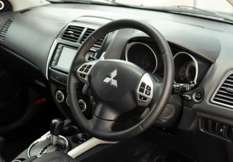 Подержанный автомобиль Mitsubishi RVR Suv 2010 года (11 фото)