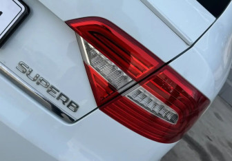 Подержанный автомобиль Skoda Superb Liftback 2014 года (14 фото)