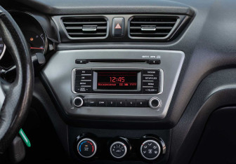 Подержанный автомобиль Kia Rio Sedan 2016 года (14 фото)