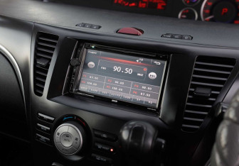 Подержанный автомобиль Mazda Biante 2009 года (13 фото)