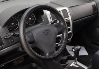 Подержанный автомобиль Hyundai Getz 2010 года (11 фото)