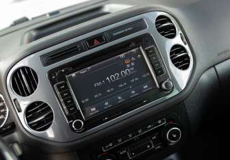 Подержанный автомобиль Volkswagen Tiguan 2013 года (14 фото)