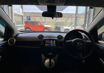 Подержанный автомобиль Mazda Demio 2007 года (9 фото)