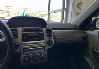 Подержанный автомобиль Nissan X-Trail 2006 года (14 фото)