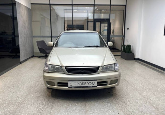 Подержанный автомобиль Toyota Corona Sedan 1999 года (2 фото)