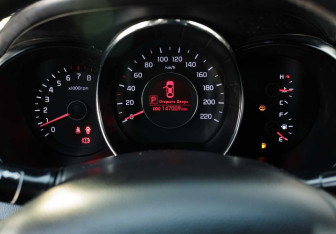 Подержанный автомобиль Kia Rio Sedan 2014 года (13 фото)