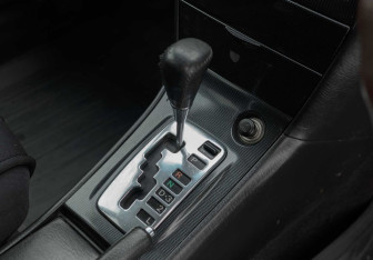 Подержанный автомобиль Toyota Corolla Wagon 2004 года (14 фото)