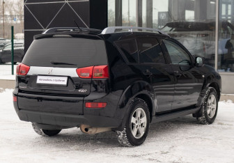 Подержанный автомобиль Peugeot 4007 2012 года (5 фото)