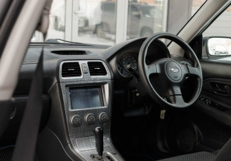 Подержанный автомобиль Subaru Impreza Wagon 2007 года (10 фото)