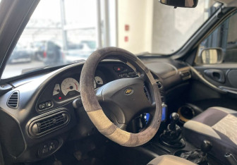 Подержанный автомобиль Chevrolet Niva 2007 года (8 фото)