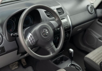 Подержанный автомобиль Suzuki SX4 Hatchback 2013 года (11 фото)