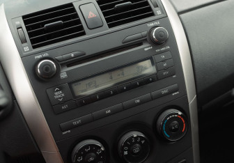 Подержанный автомобиль Toyota Corolla Sedan 2009 года (13 фото)