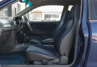 Подержанный автомобиль Mitsubishi Mirage Hatchback 1997 года (16 фото)