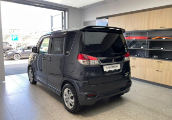 Подержанный автомобиль Suzuki Solio 2013 года (7 фото)