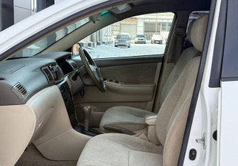 Подержанный автомобиль Toyota Corolla Sedan 2002 года (19 фото)