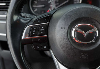 Подержанный автомобиль Mazda CX-5 2015 года (12 фото)