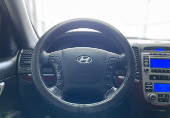 Подержанный автомобиль Hyundai Santa Fe 2008 года (13 фото)