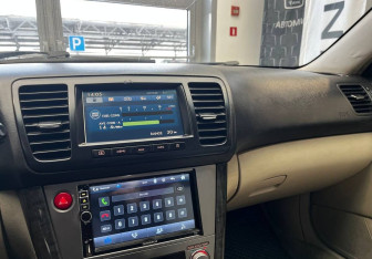 Подержанный автомобиль Subaru Legacy Sedan 2004 года (9 фото)