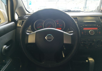 Подержанный автомобиль Nissan Tiida Sedan 2013 года (9 фото)