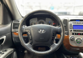 Подержанный автомобиль Hyundai Santa Fe 2009 года (11 фото)