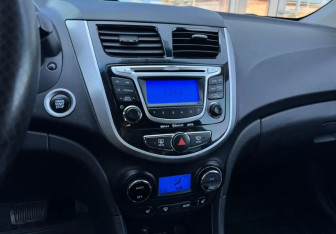 Подержанный автомобиль Hyundai Solaris Sedan 2011 года (13 фото)