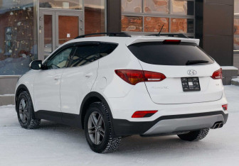 Подержанный автомобиль Hyundai Santa Fe 2016 года (7 фото)