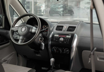 Подержанный автомобиль Suzuki SX4 Hatchback 2012 года (10 фото)