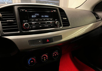 Подержанный автомобиль Mitsubishi Lancer Sedan 2013 года (9 фото)