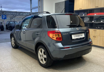 Подержанный автомобиль Suzuki SX4 Hatchback 2009 года (6 фото)