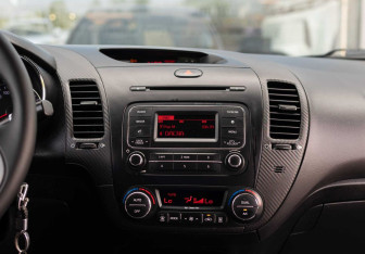 Подержанный автомобиль Kia Cerato Sedan 2013 года (14 фото)