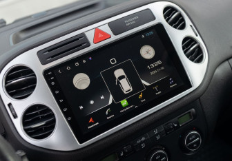 Подержанный автомобиль Volkswagen Tiguan 2009 года (13 фото)