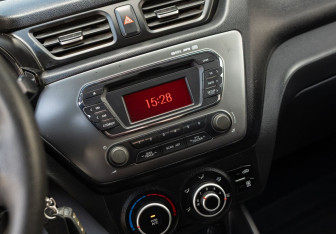 Подержанный автомобиль Kia Rio Sedan 2013 года (13 фото)