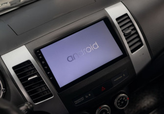 Подержанный автомобиль Mitsubishi Outlander 2008 года (14 фото)