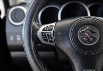 Подержанный автомобиль Suzuki Grand Vitara 2013 года (12 фото)