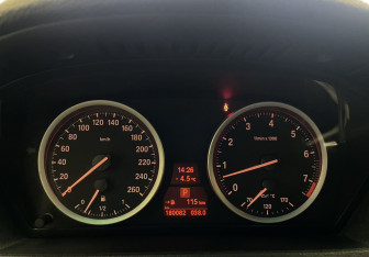 Подержанный автомобиль BMW X6 2013 года (13 фото)