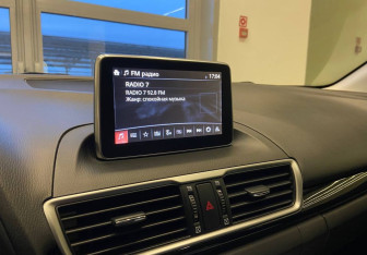 Подержанный автомобиль Mazda 3 Sedan 2014 года (10 фото)