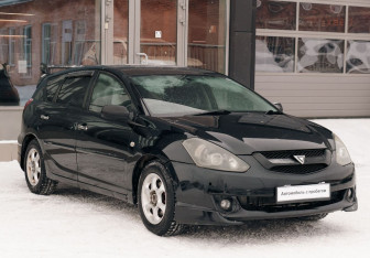 Подержанный автомобиль Toyota Caldina 2003 года (3 фото)