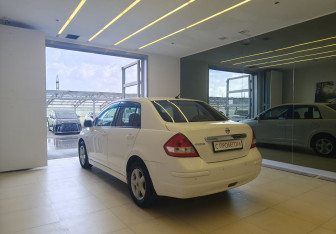 Подержанный автомобиль Nissan Tiida Sedan 2013 года (6 фото)