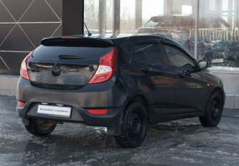 Подержанный автомобиль Hyundai Solaris Hatchback 2011 года (5 фото)