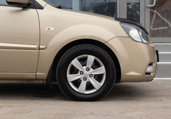 Подержанный автомобиль Kia Rio Sedan 2011 года (9 фото)