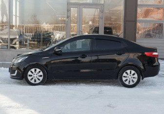 Подержанный автомобиль Kia Rio Sedan 2014 года (8 фото)