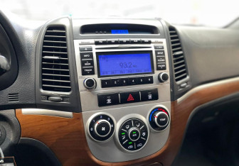 Подержанный автомобиль Hyundai Santa Fe 2009 года (15 фото)