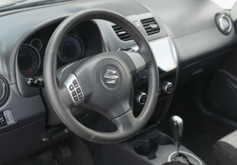 Подержанный автомобиль Suzuki SX4 Hatchback 2010 года (11 фото)