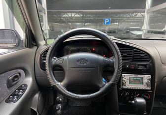 Подержанный автомобиль Kia Spectra Sedan 2006 года (13 фото)