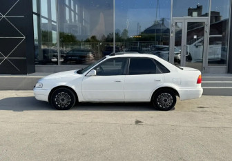 Подержанный автомобиль Toyota Sprinter Sedan 1998 года (13 фото)