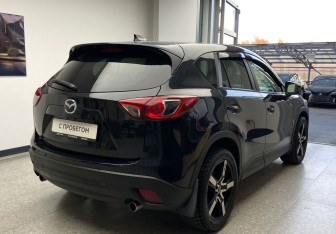 Подержанный автомобиль Mazda CX-5 2011 года (5 фото)