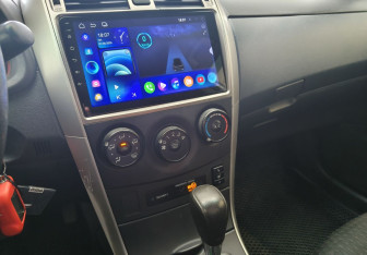 Подержанный автомобиль Toyota Corolla Sedan 2010 года (11 фото)