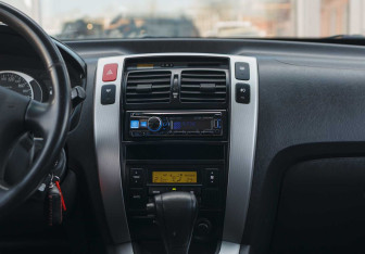 Подержанный автомобиль Hyundai Tucson 2007 года (13 фото)