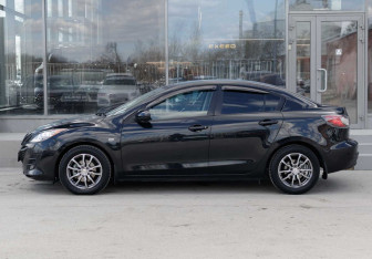 Подержанный автомобиль Mazda 3 Sedan 2009 года (8 фото)
